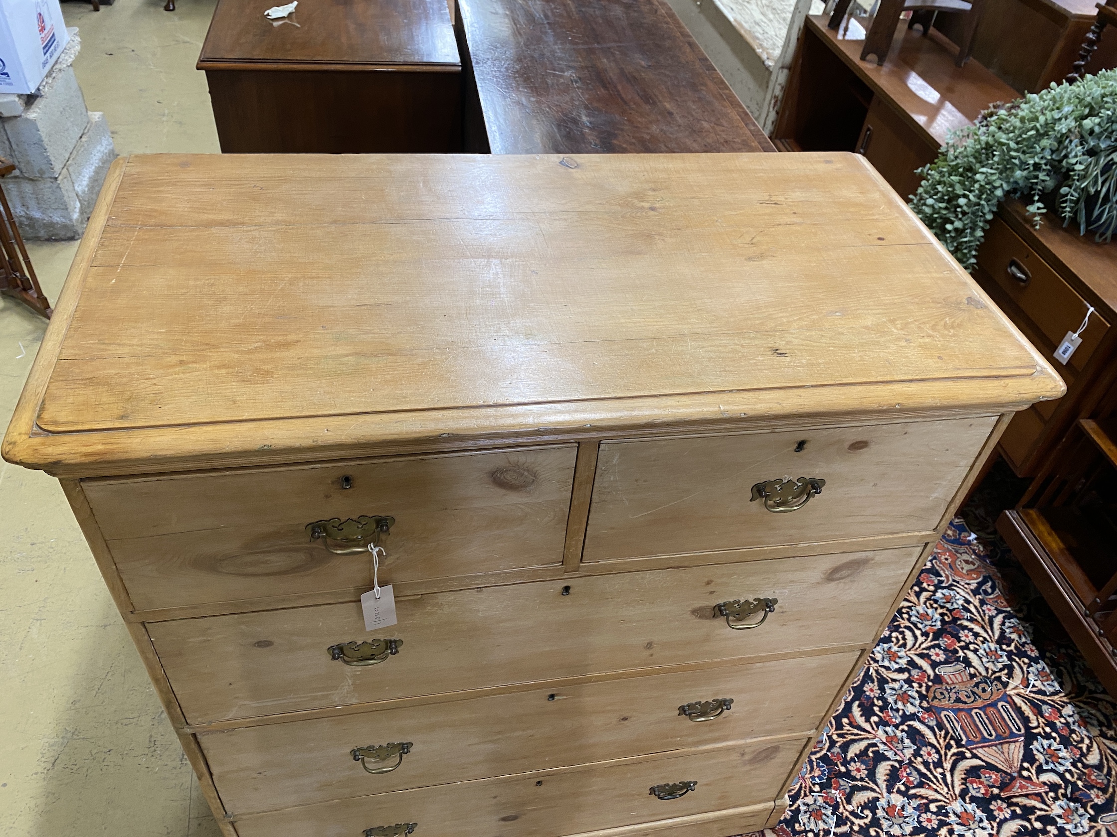 A Victorian pine chest of five drawers, width 104cm, depth 53cm, height 119cm